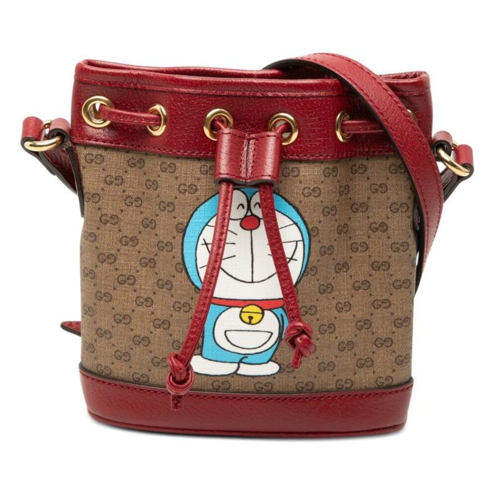 Gucci Mini GG Supreme Bucket Bag